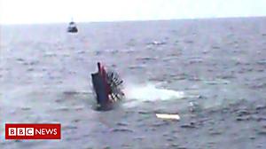 Moment paddle steamer sinks into sea