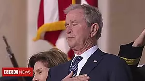President Bush Jr fighting back the tears