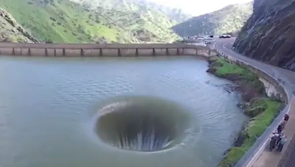 [Pics] Man Notices A Strange Hole In A Lake, So He Flies Drone Inside And Captures Something Unexpected