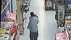 [Pics] Walmart Security Cameras Capture A Man Grabbing A Little Girl Who Does The Impossible