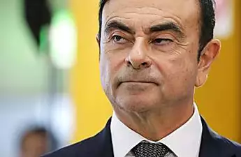 Japan media blasts 'cowardly' Ghosn after escape