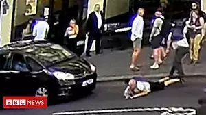 Man pushed into busy London traffic