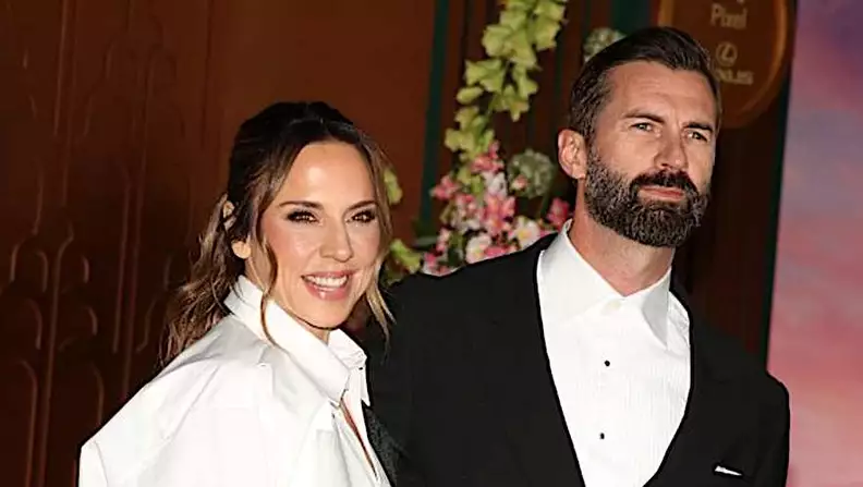 Sporty Spice marries Australian model in Victoria Beckham-designed wedding gown Sporty Spice marries Australian model in Victoria Beckham-designed wedding gown