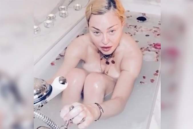 Madonna calls coronavirus ‘the great equalizer’ in bizarre bathtub video