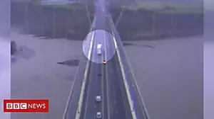 Lorry caught on CCTV as it is blown over