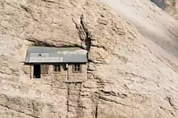 Climbers find house in Mountain Side. Then they take a look Inside!