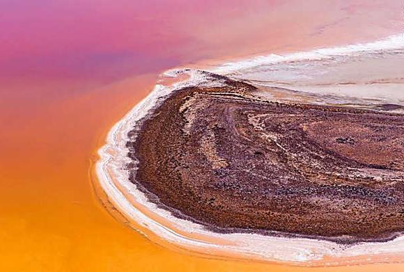 Crazy rainbow lake suddenly appears in desert