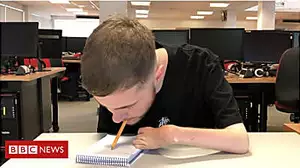 The student who writes with his mouth