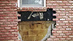 [Photos] Man Tearing Down Brick Wall Uncovers A Sight That's Straight Out Of A Bad Dream