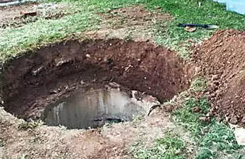 [Pics] Man Buys Home And Digs Holes In His Backyard Because Of Rumors, Then He Finds It