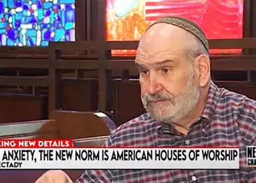 NY rabbi targeted by online hate as suspect taken into custody