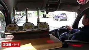 The taxi with a pub in the front seat