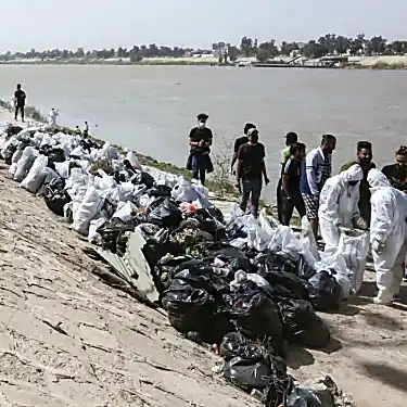 Οι Ιρακινοί καθαρίζουν το ποτάμι καθώς ριζώνουν τα πρώτα πράσινα έργα