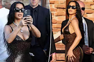 Kim Kardashian sports slinky Versace and diamonds galore for Lauren Sánchez and Jeff Bezos’ wedding