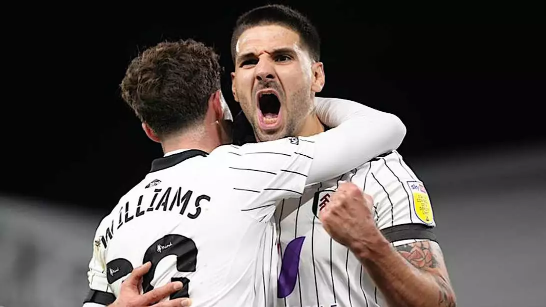 Fulham 3-0 Millwall: Aleksandar Mitrovic edges closer to Championship history with double as league leaders cruise to victory