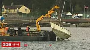 Yacht recovered after ferry crash