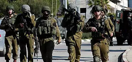 Ισραηλινός στρατιωτικός έτοιμος να επιβάλει τον πιθανό συνολικό τερματισμό της χώρας