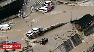Japan towns engulfed by landslides