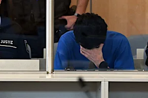 Suspect in stabbing attack at German festival admits killings at trial