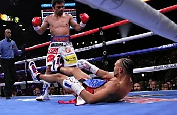 Brilliant Pacquiao downs Thurman to capture WBA crown