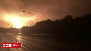 Gas line explosion sends flames into sky