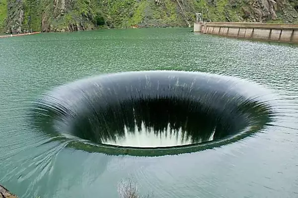 [Photos] Local Authorities Advise Not Going Near Holes In Lakes, Like This One