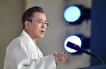 South Korea's Moon offers olive branch to Japan