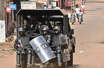Outcry in Guinea over police 'human shield' video