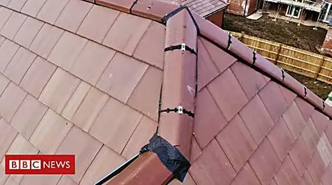 New build roof tiles 'held on with duct tape'