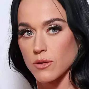 Braless Katy Perry wows in a daring gown at Capital's Jingle Bell Ball