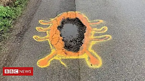 Pothole protester 'bugs' council officials