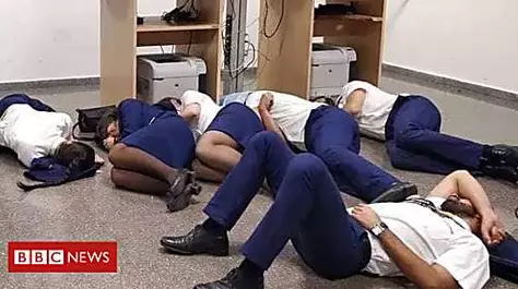Ryanair sacks staff who 'slept on floor'