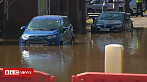 Burst water main leaves craters in road
