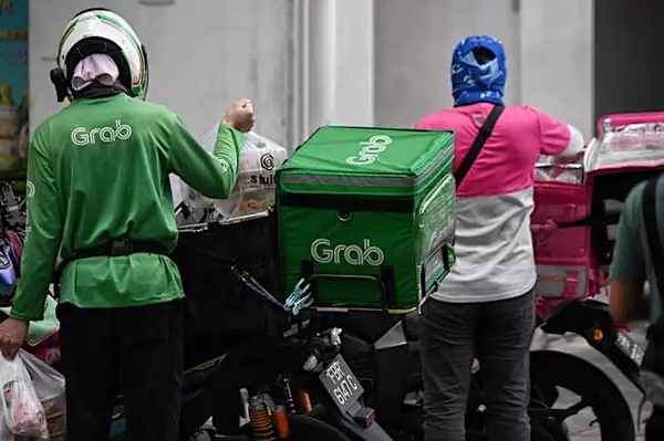 Mobility, delivery firms take different tacks to help riders, drivers tackle fuel spikes in S-E Asia