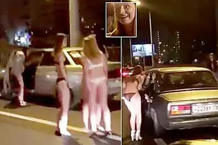 Ρωσίδες γδύνονται στη μέση του δρόμου και παρακαλούν τους οδηγούς για χρήματα και γαμπρό... (vid)