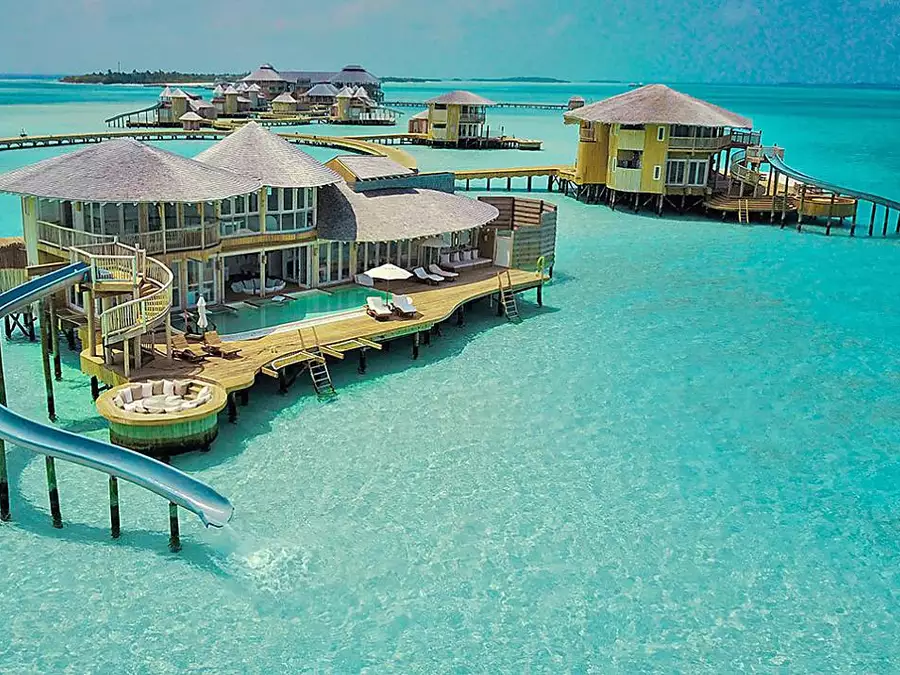 Over-Water Villa in the Maldives With a Private Pool and a Water Slide into the Indian Ocean