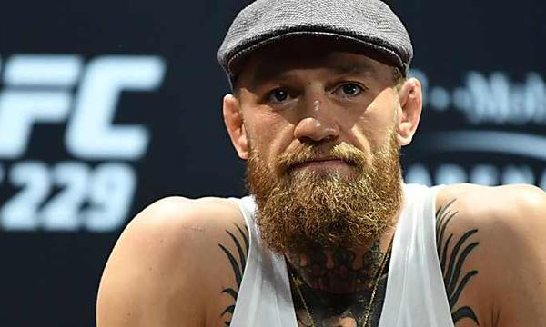 Conor McGregor Shown Punching Man over Alleged Whiskey Dispute on Video