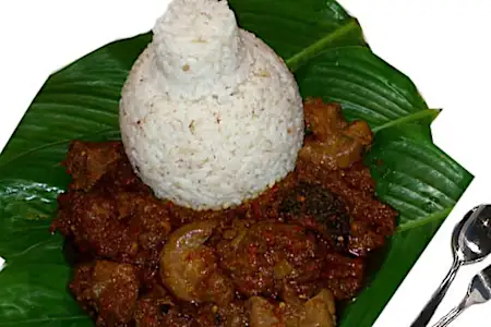 Why does ofada rice smell unpleasantly?