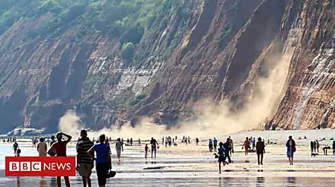 Beachgoers warned after huge cliff fall