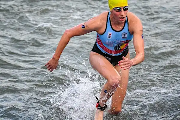 Belgian triathlete who fell ill after Seine race says she did not contract E. coli