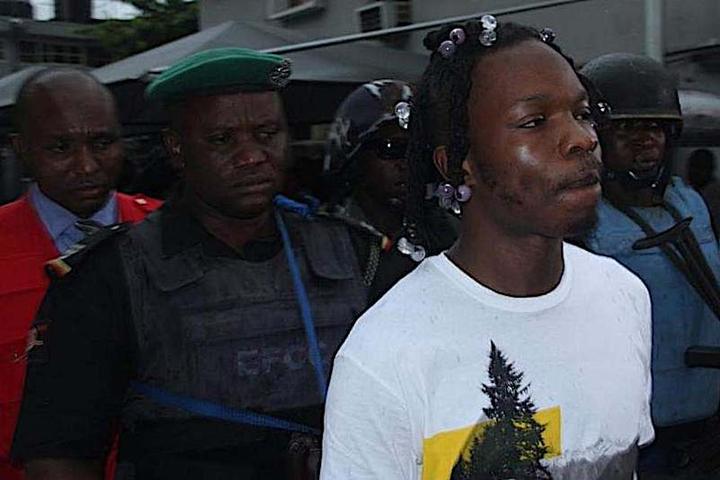 EFCC asks court to order Naira Marley to remove Red Bag from dock