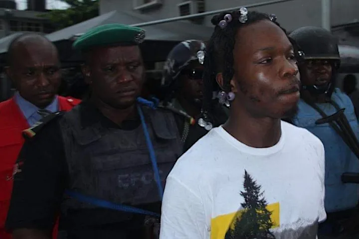 EFCC asks court to order Naira Marley to remove Red Bag from dock