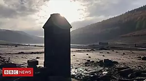 Flooded village revealed by low water