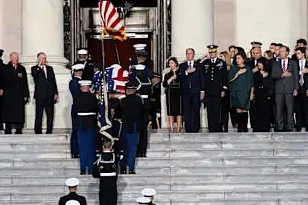 Bush's coffin arrives at Capitol; Trump plans to attend funeral