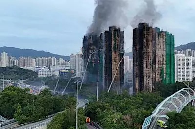 Hong Kong apartment fire: Why it spread and how it affects politics