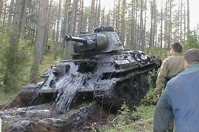 [Photos] Boy Finds Tank Buried In Mud, Opens Hatch And Realizes What Army Has Done