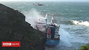 Dramatic storm rescue as ship hits cliff