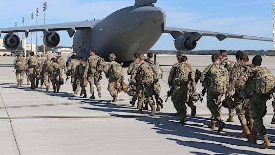 Some military families are caught off guard as thousands of troops get called up for Middle East deployment