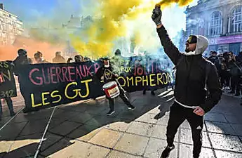 France's yellow vests seek show of strength for anniversary