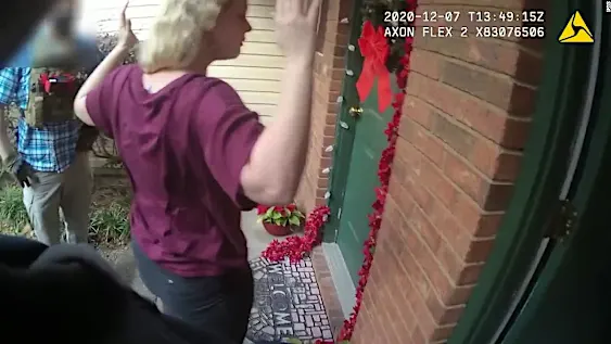 Body camera footage shows police outside in raid of Rebekah Jones' home Body camera footage shows police outside in raid of Rebekah Jones' home
